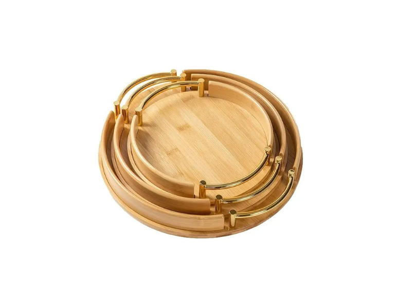 Bandejas redondas de bambú con asas doradas